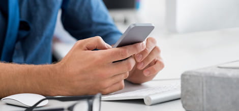 Man checking emails on phones